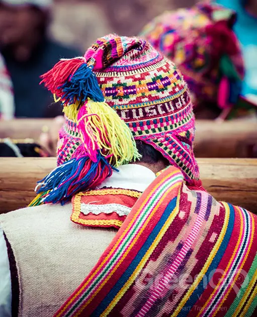 Peru Tours - Indigenous man with colorful clothing Peru Tours - Indigenous man with colorful clothing