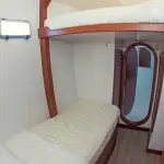 Nemo 2 Galapagos Catamaran - Cabin 4 Lower single bed and double upper bed