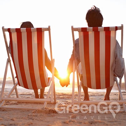 Galapagos-Honeymoon-Couple-relaxing-on-beach