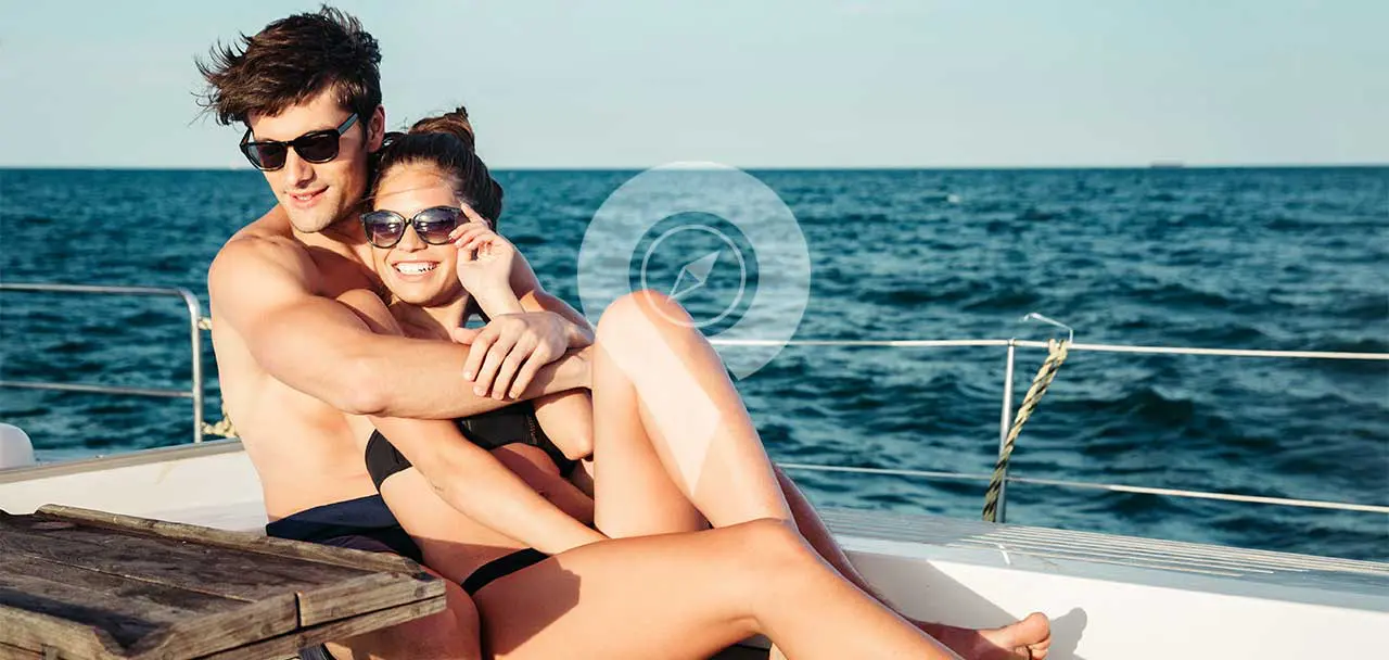 Seaman Galapagos Cruise Honeymoon-Packages-Honeymoon-Couple-Cuddling-On-Deck