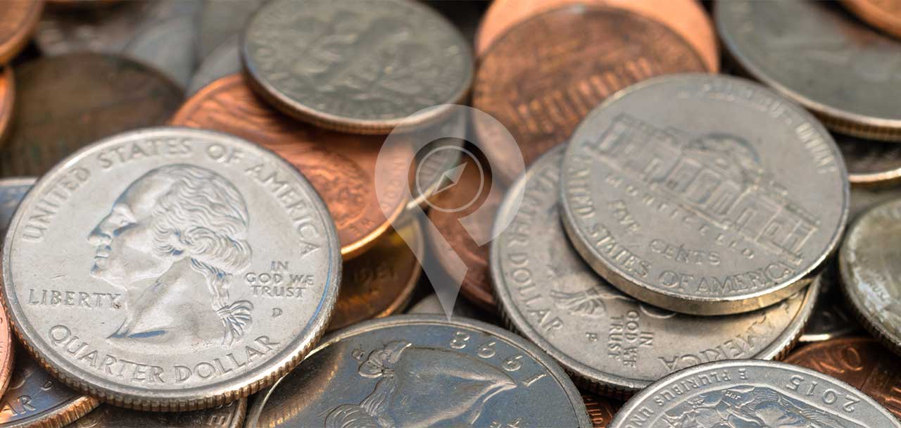 Pile of Coins - Tipping in Galapagos and Ecuador