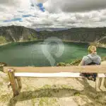 women-seated-at-quilotoa-lagoon