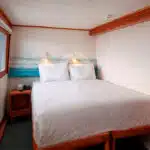 Coral-Galapagos-Yachts-junior-cabin-double-bed