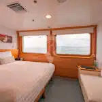 Legend-Galapagos-Yacht-junior-suit-double-bed