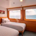 Legend-Galapagos-Yacht-junior-suit-twin-beds