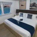 Natural-Paradise-Galapagos-Yacht-main-deck-cabin