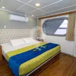 Tip-Top-2-Galapagos-Catamaran-double-bed-upper-deck